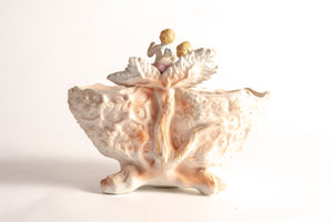 FOOTED TWO CHERUB BISQUE FIGURINE WITH DOUBLE PLANTER