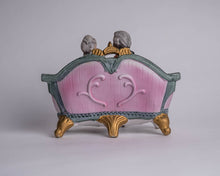 BISQUE COLONIAL COUPLE ON COUCH
