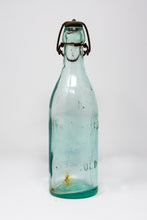 VINTAGE 9 1/2 INCH GREEN GLASS BOTTLE WITH UNUSUAL SWING TOP METAL STOPPER