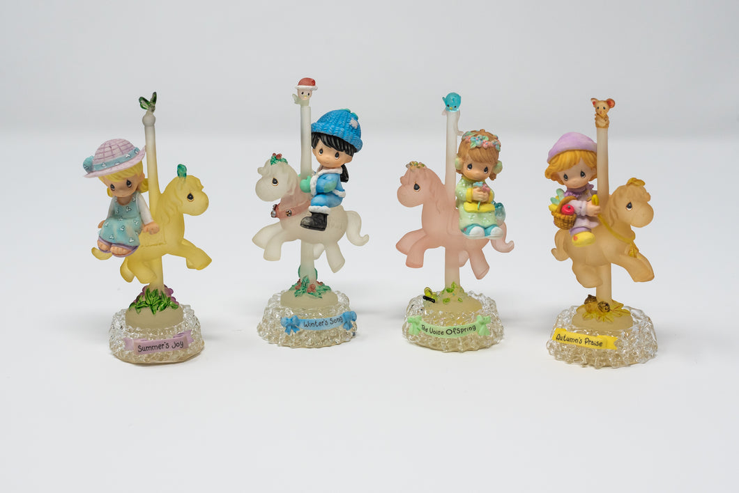 PRECIOUS MOMENTS CAROUSEL FIGURINES - 4 SEASONS